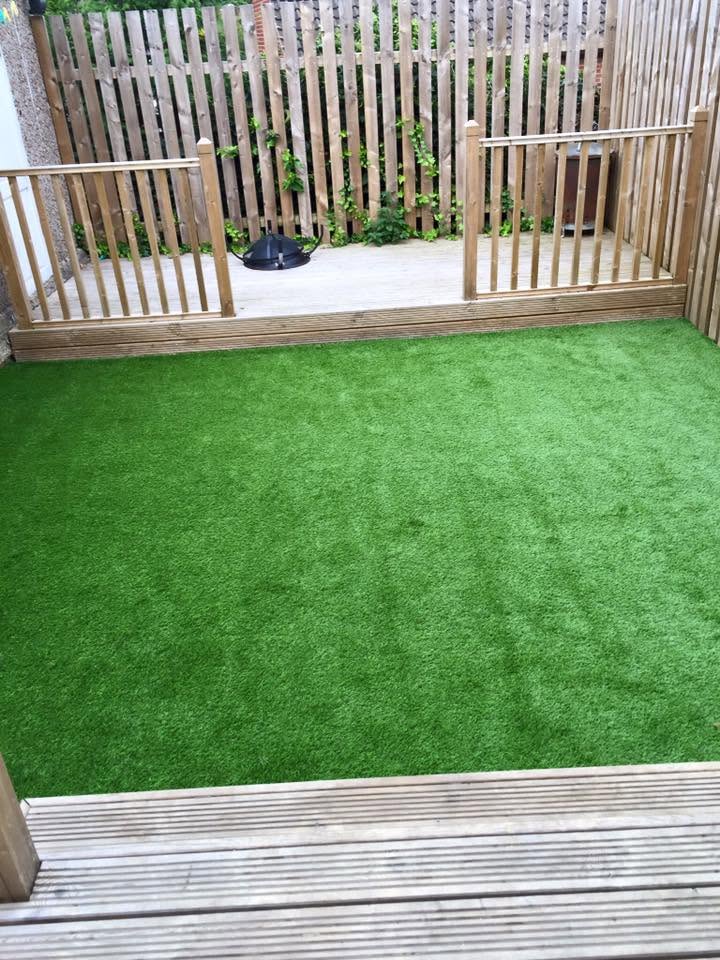 Artificial grass garden with timber decking