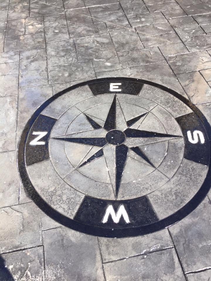 Imprinted concrete with a bespoke compass feature